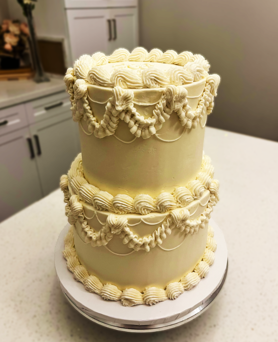 Two-tier vintage buttercream cake